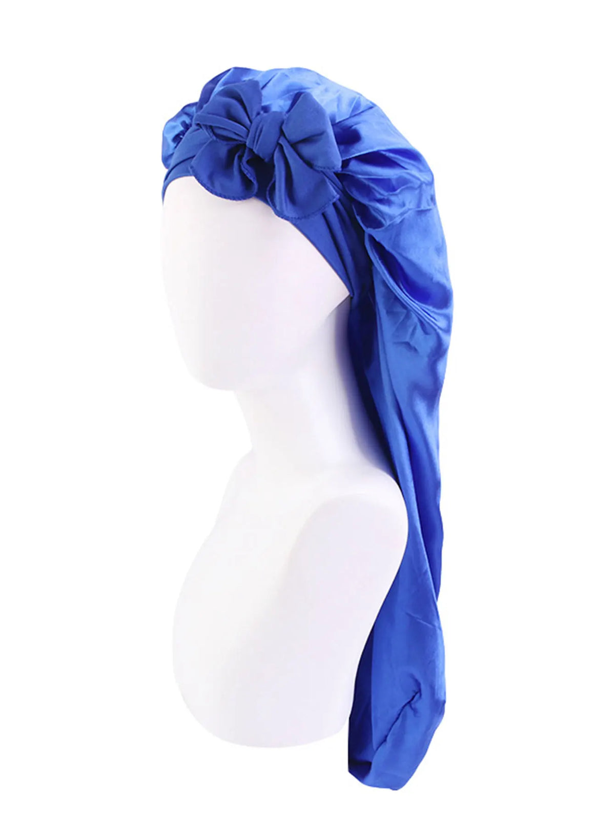 A bright blue satin sleep bonnet tied in a bow, displayed on a white mannequin head.