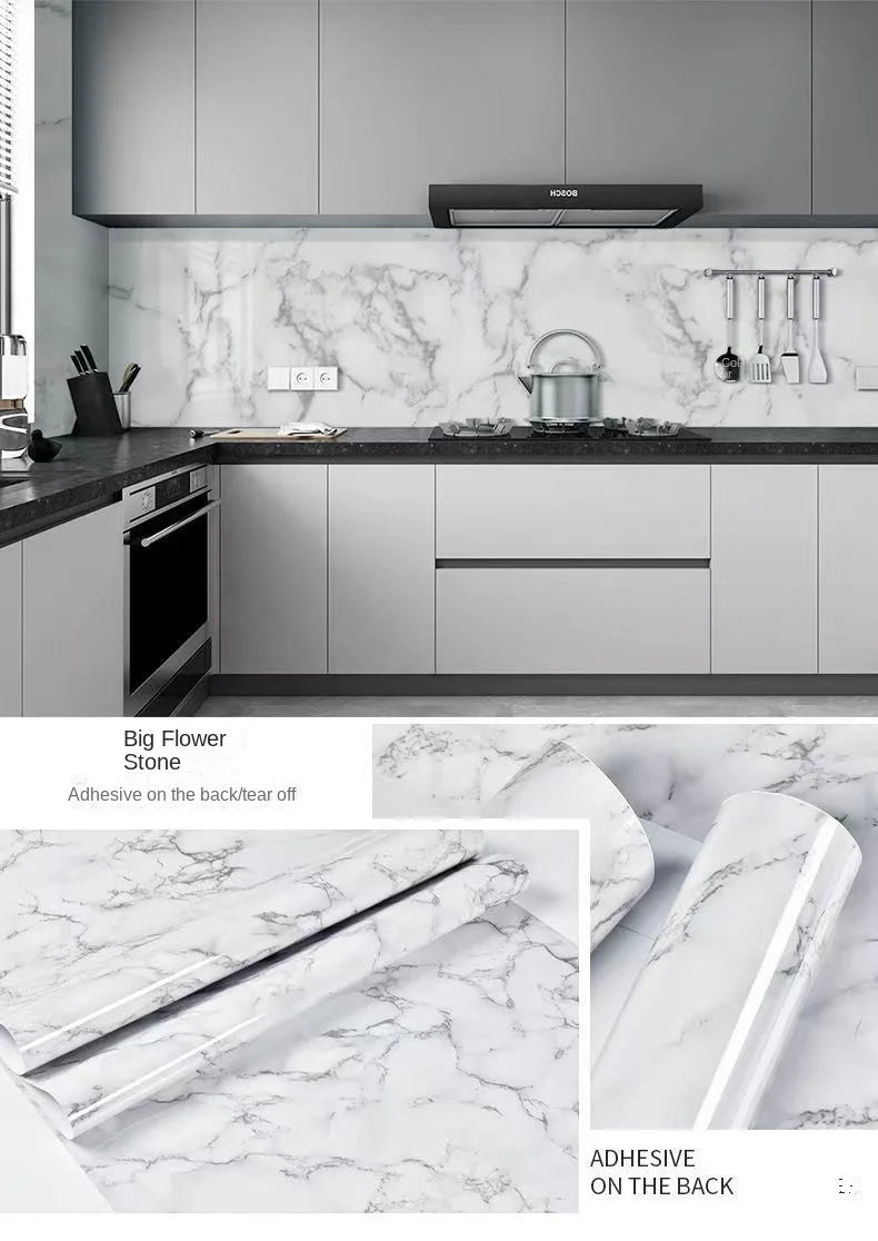 Close-up view of white marble contact paper showing the texture and adhesive quality on a surface.