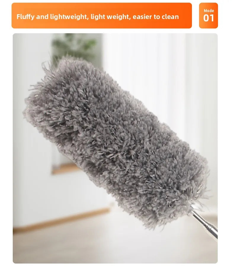 A close-up view of a fluffy gray microfiber duster with an extendable handle.