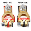 A comparison of positive and negative quick-release copper car battery terminals, showing their sizes in inches and millimete
