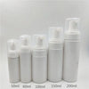 A row of white refillable foaming soap dispenser bottles in various sizes from 50ml to 200ml.