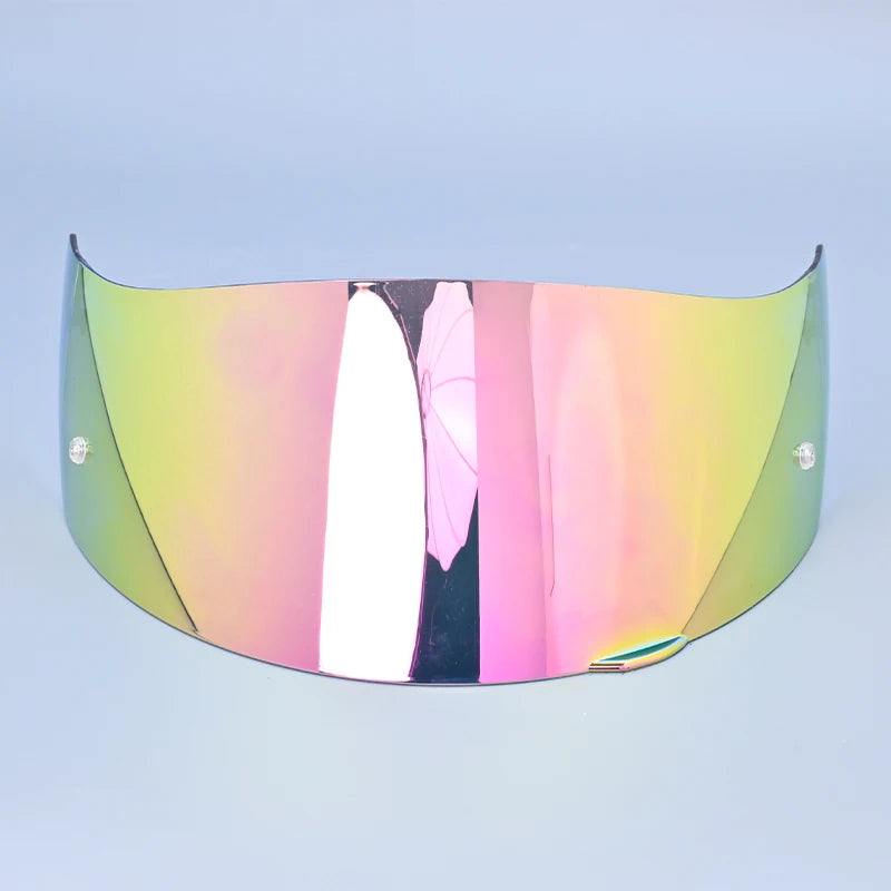 A motorcycle helmet visor lens shield with a gradient rainbow color finish.