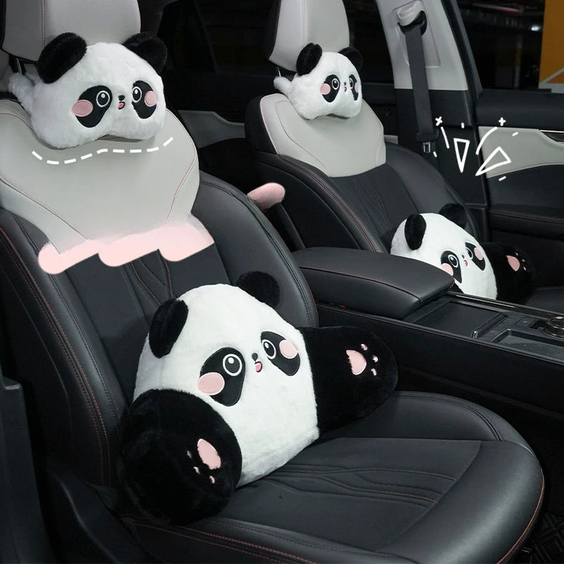 Black car seats with white panda plush headrests and lumbar support cushions.
