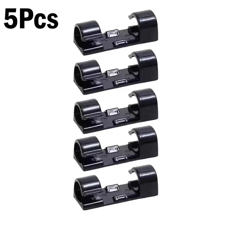 Five black self-adhesive cable clips designed for wire management.