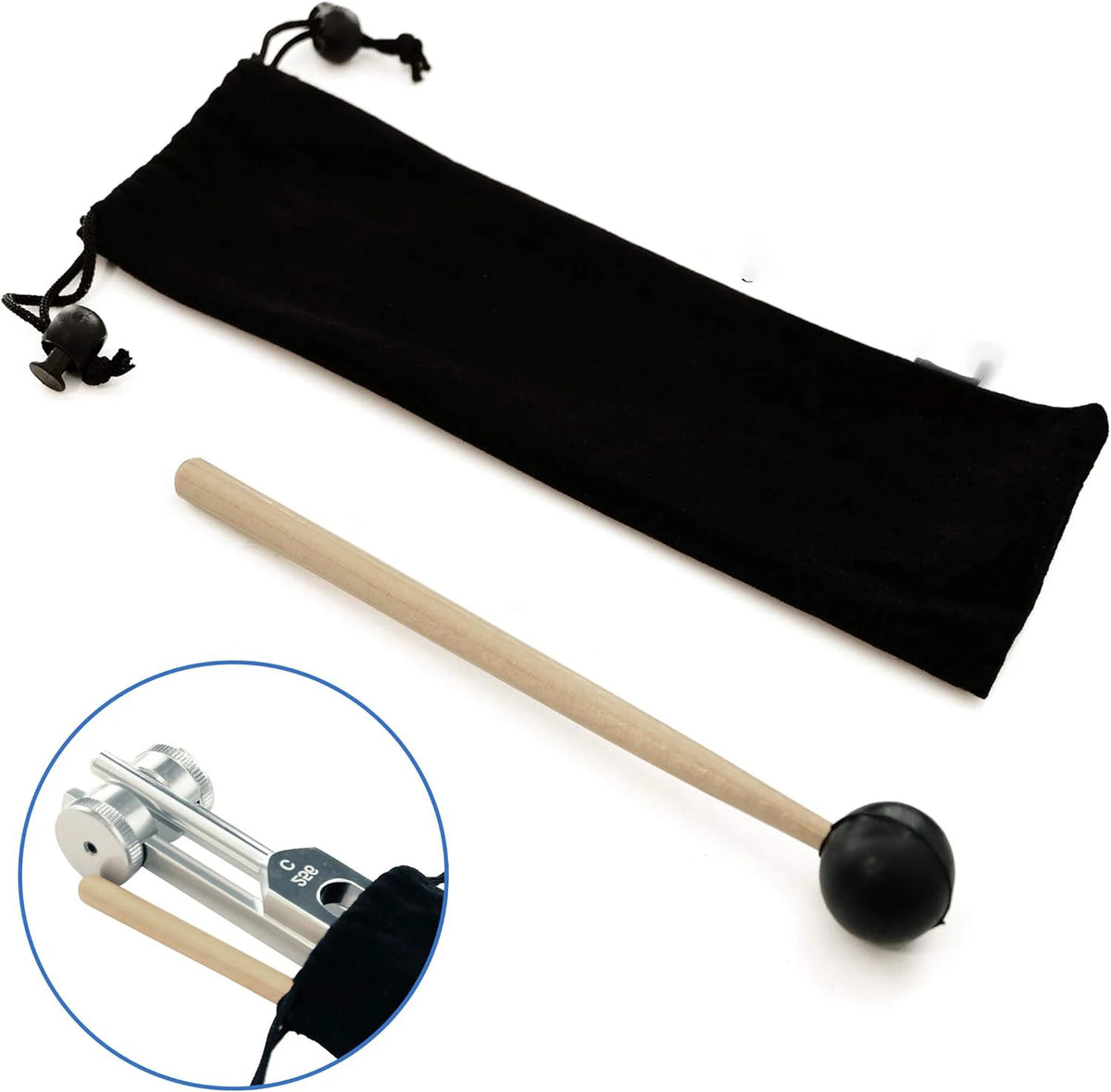 A black weighted tuning fork is shown next to a wooden mallet, illustrating the sound healing tool.