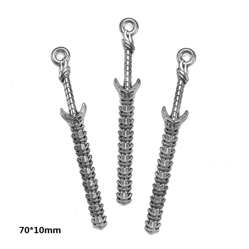 A set of 16 gun-shaped charms for DIY jewelry making in mixed styles, silver color.