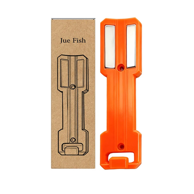 A cardboard box and an orange magnetic wall-mounted organizer for spray cans.
