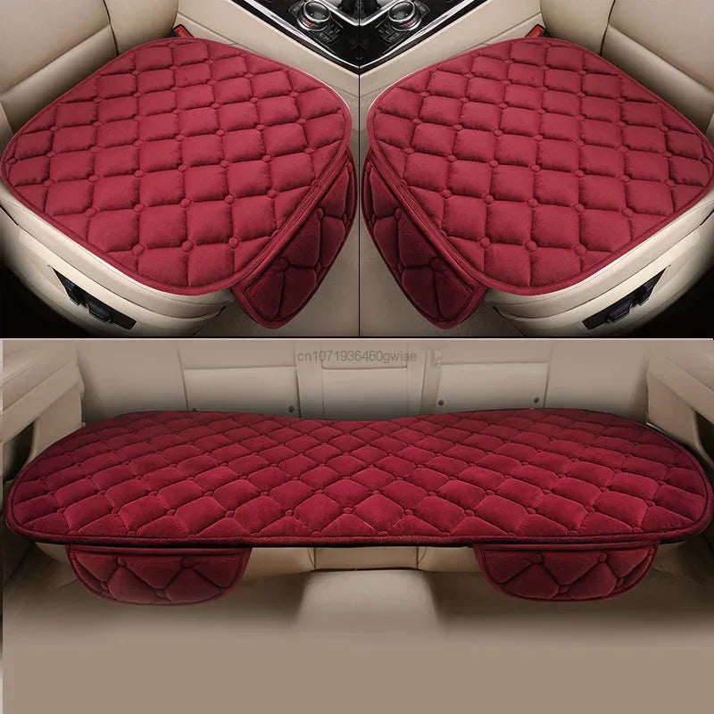 A deep red quilted plush car seat cover designed as a universal anti-slip protector for front seats.