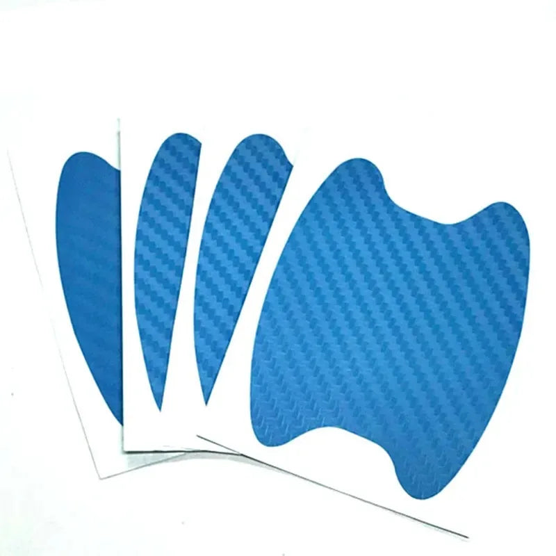 A pack of blue carbon fiber film protecting a car door handle.