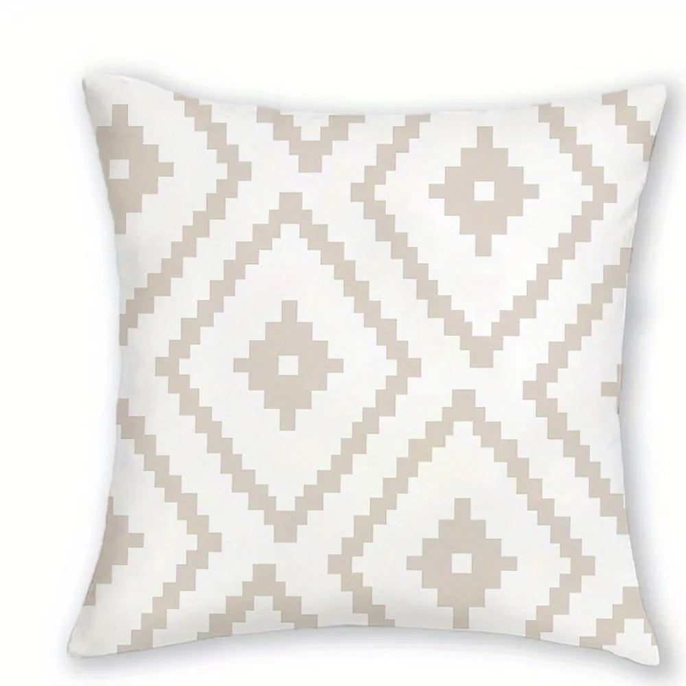 A decorative pillowcase featuring a white background with a geometric diamond pattern in beige and gray.