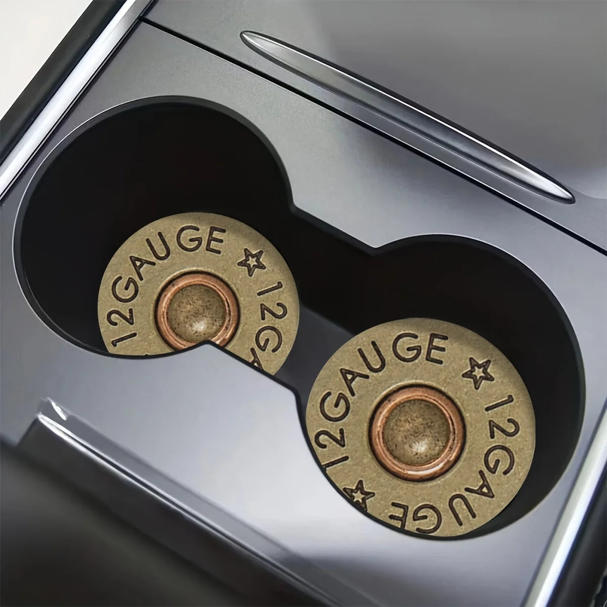 Close-up view of a car cup holder with two absorbent leather mats featuring a gauge and star pattern.