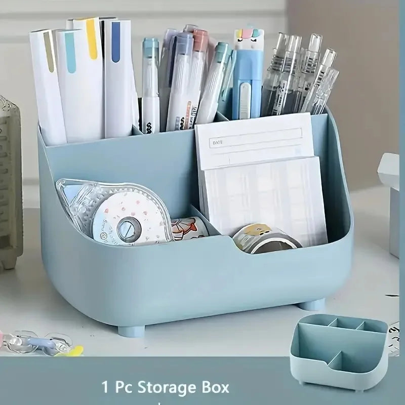 A light blue storage box filled with various pens, markers, and office supplies.