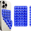 A silver smartphone is shown next to a blue suction cup mount with multiple clear silicone domes.