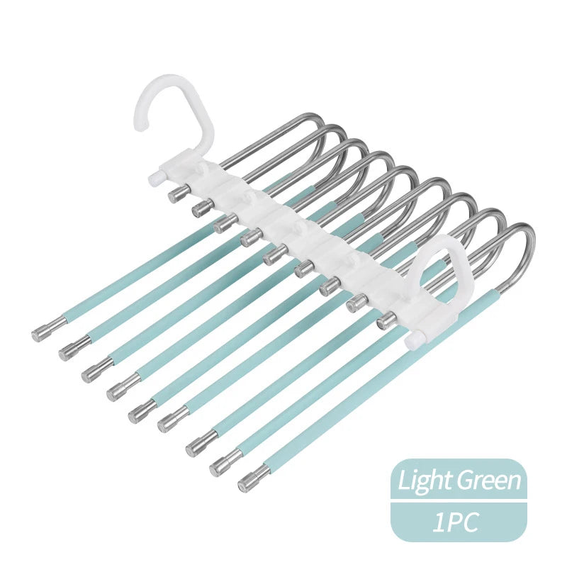 A set of nine light green non-slip stainless steel pants hangers.