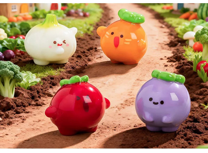 A collection of hand-painted resin vegetable figurines in various colors like yellow, orange, red, and purple placed in brown