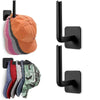 A set of black adhesive hooks designed for hanging hats, bags, and coats.