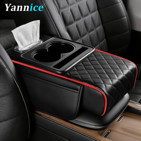 A black center console armrest pad with a heart-shaped cup holder and a tissue is shown in a car interior.