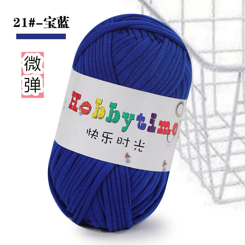 A ball of bright blue soft T-shirt yarn for crochet and knitting is shown against a white background.