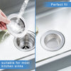 A close-up showing a stainless steel drain strainer being used in a kitchen sink, demonstrating a perfect fit.