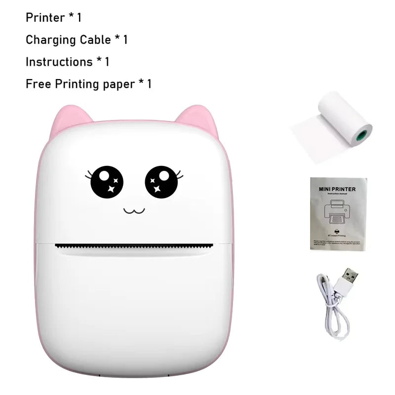 A white portable Bluetooth thermal printer with a cute face design and accessories laid out beside it.