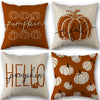 A set of vintage fall pumpkin pillow covers in orange and beige tones.