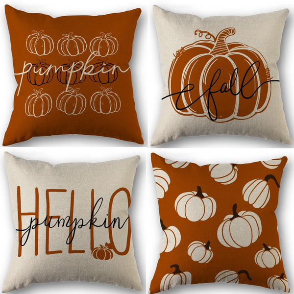 A set of vintage fall pumpkin pillow covers in orange and beige tones.