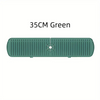 A 35cm green silicone faucet drain mat for kitchen and bathroom countertop protection.