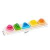 A wooden sorting and stacking toy set featuring colorful blocks in pink, green, blue, and yellow.