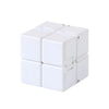 A white Infinity Cube fidget toy with multiple interlocking cubes.