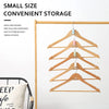 A set of wooden cascading clothes hanger connectors used for space-saving wardrobe organization.