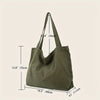 Sac à main en toile de couleur vert olive, avec diverses mesures.