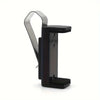 A black clip holder designed to secure a garage door remote and visor.