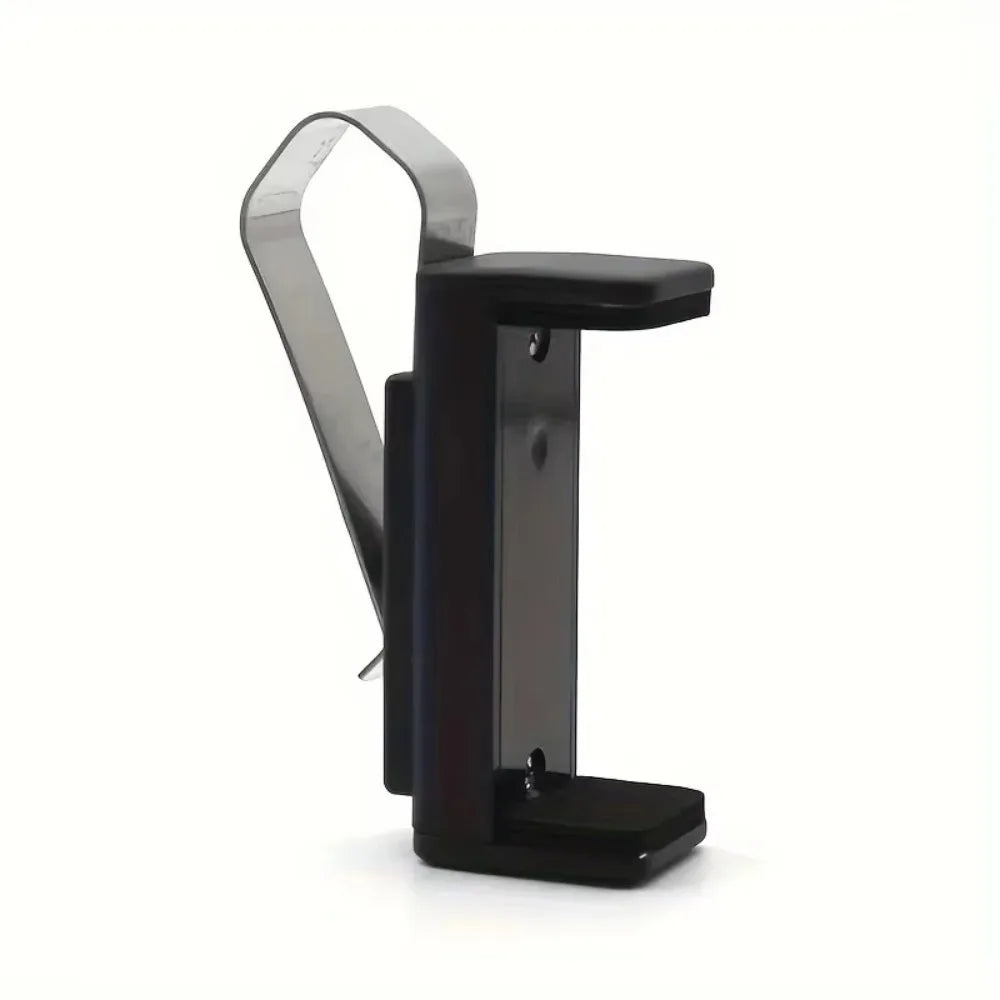 A black clip holder designed to secure a garage door remote and visor.