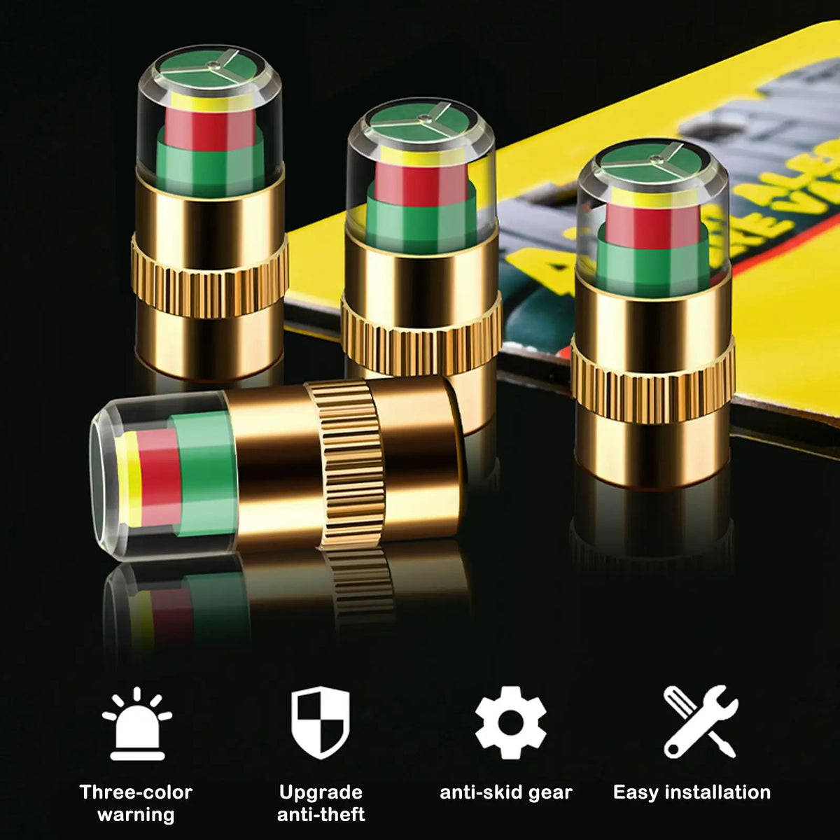 A set of four color-coded tire pressure indicator valve caps displayed on a black surface with related tools and warnings.