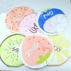 A collection of pink, orange, and green fruit-themed waterproof shower caps for women.