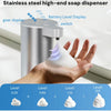 A hand holds a stainless steel automatic foam soap dispenser with a glowing nozzle, showing various dispensing levels.