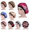 A collection of satin hair bonnets in various floral and patterned designs shown on a mannequin head.