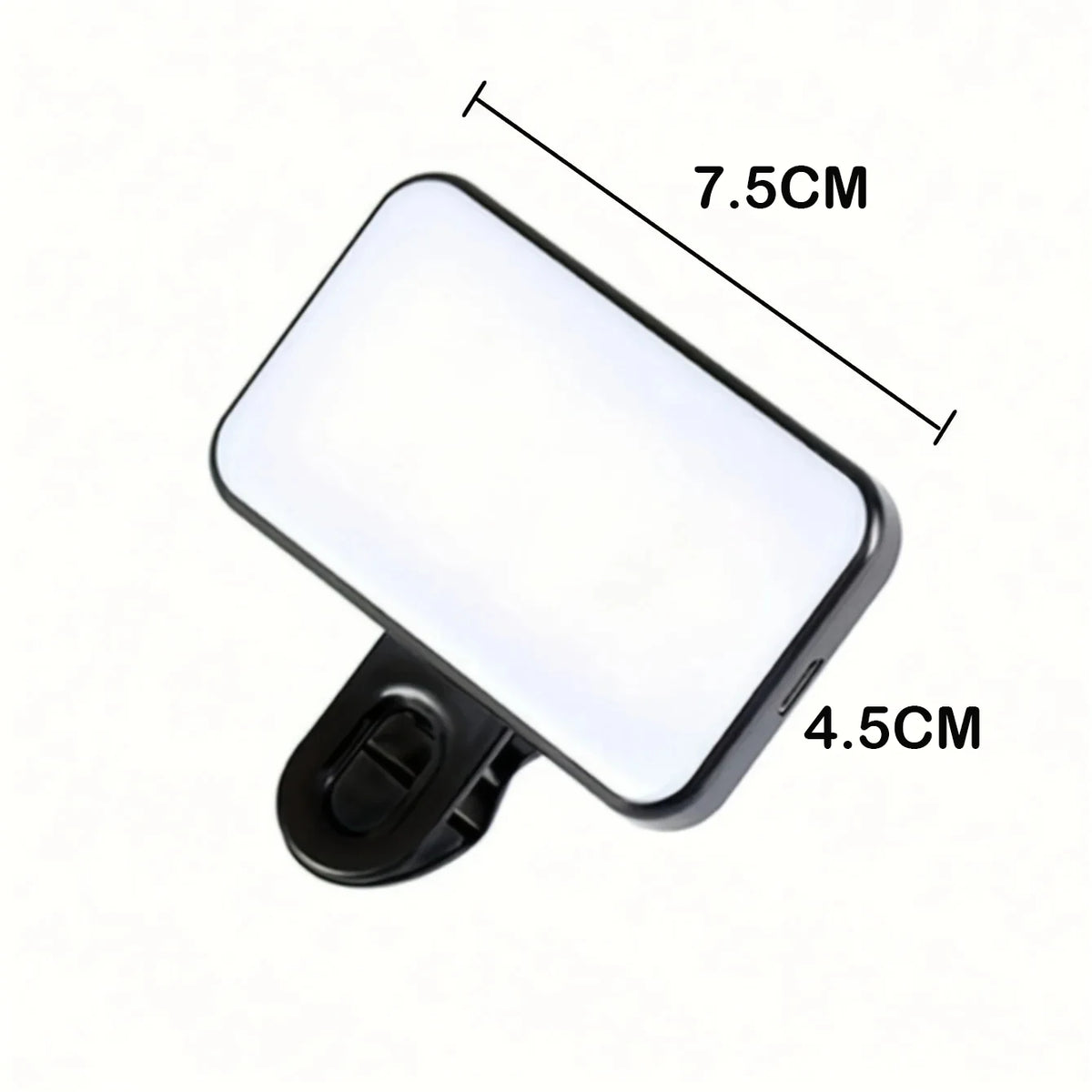 A portable clip-on LED selfie light with a rectangular white light panel and a black clip.