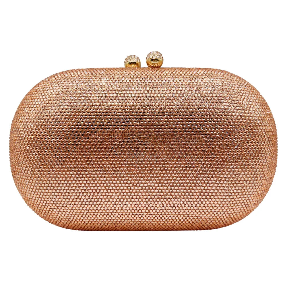 Pochette de soirée ronde en strass rose gold avec une bandoulière à chaîne.