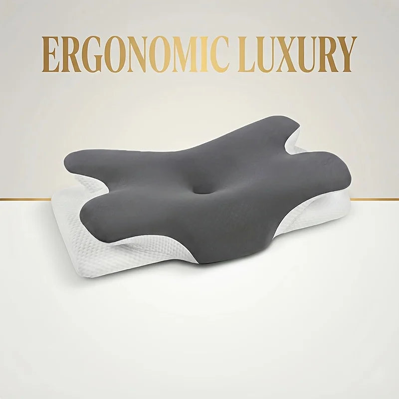 Grauer ergonomischer Memory-Foam-Nackenkissen mit weißen Akzenten vor hellem Hintergrund.