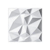 A close-up view of a white, geometric 3D diamond wall panel design.
