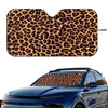 Leopard print car windshield sunshade applied to a blue car.