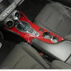 Interior view of a Chevrolet Camaro showing red trim and leather seating.