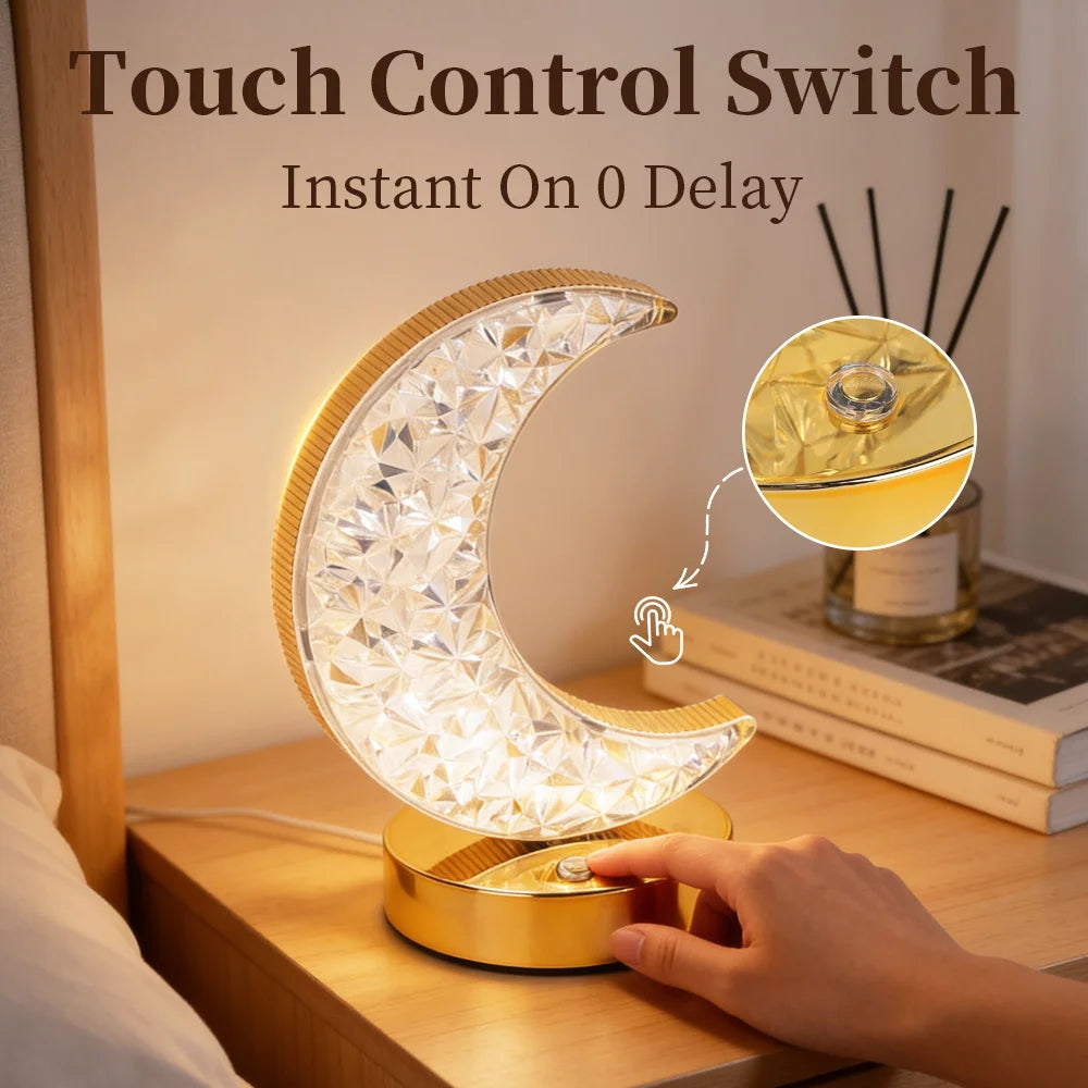 A hand interacts with a crystal star moon night light featuring a touch control switch and instant on function.