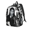 A black backpack featuring images of musical icons, including a prominent portrait.