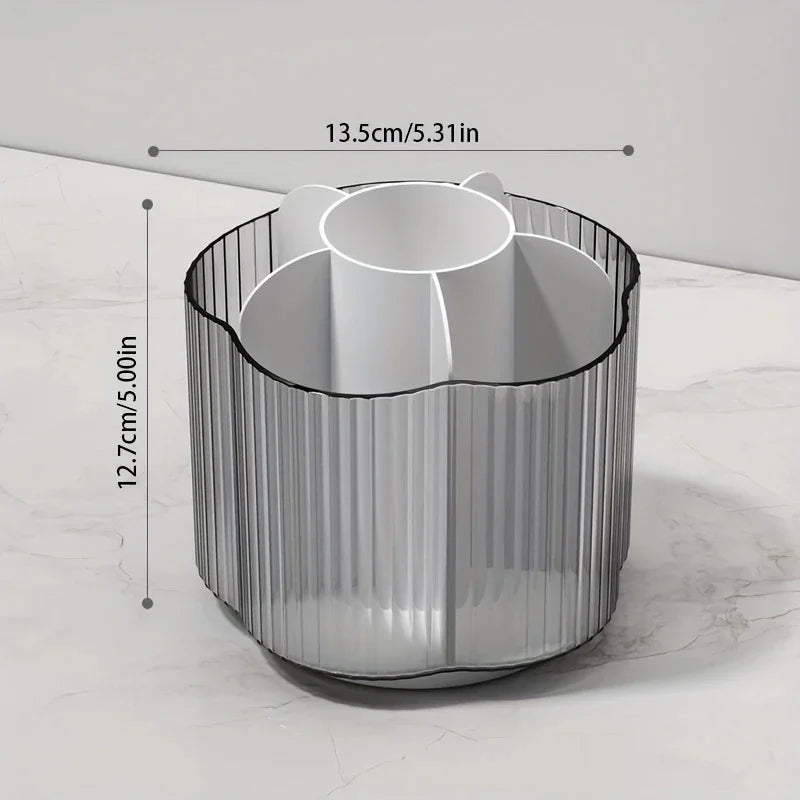 A cylindrical makeup brush holder with six compartments, made of gray ribbed plastic.