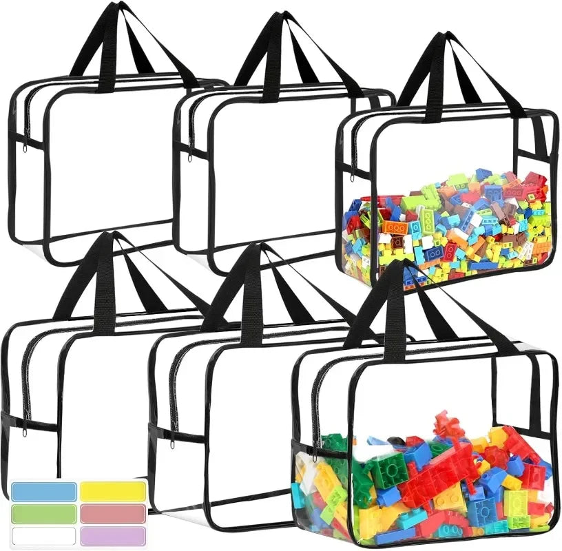 A collection of clear transparent storage bags with black handles and zippers for organizing toys and cosmetics.