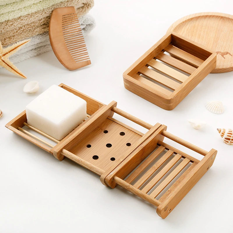 A wooden bamboo soap dish with a slotted design and drainage for natural soap.