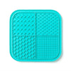 A teal silicone lick mat for pets featuring various textured patterns and suction cups.