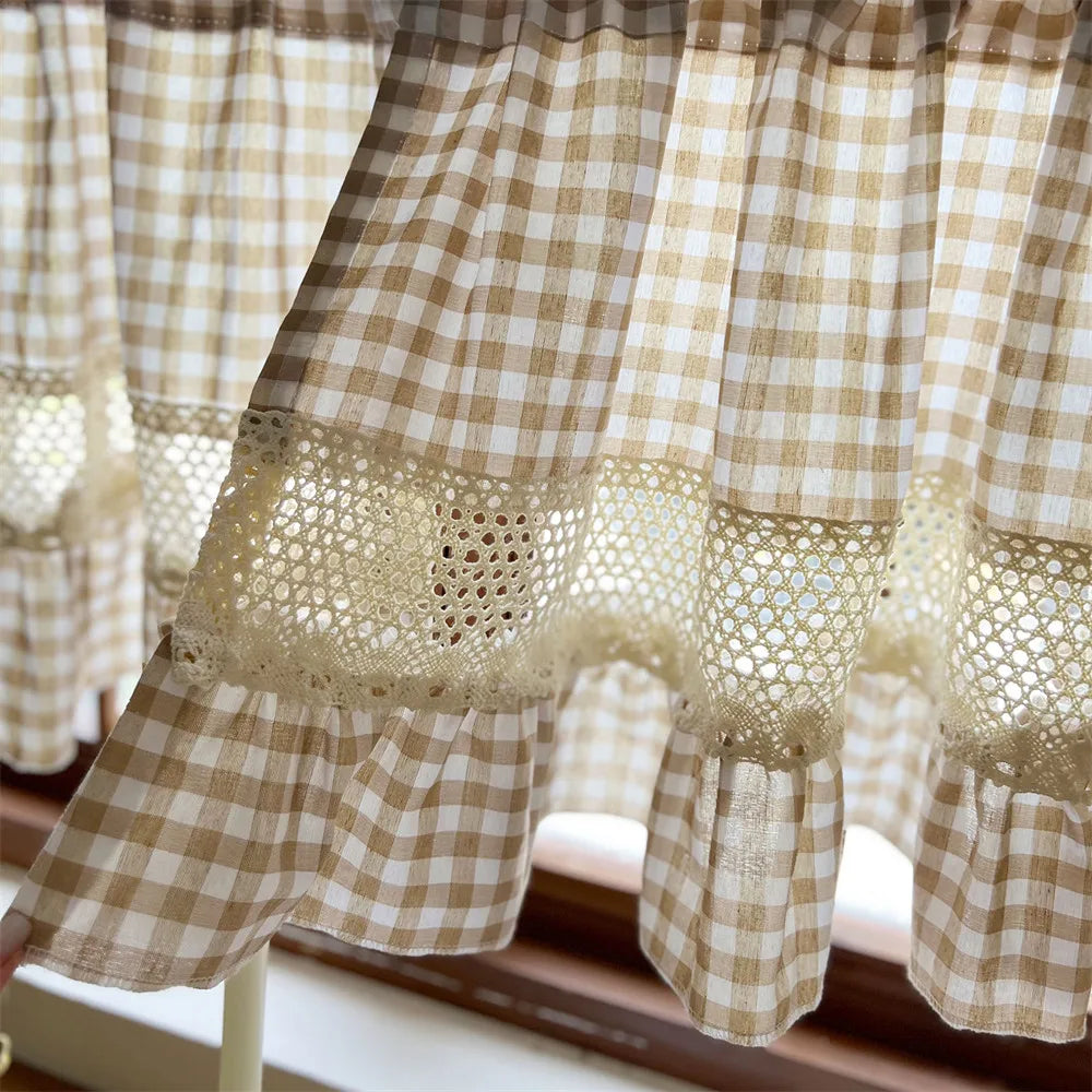 Beige gingham cafe curtain featuring a delicate crochet lace trim detail.